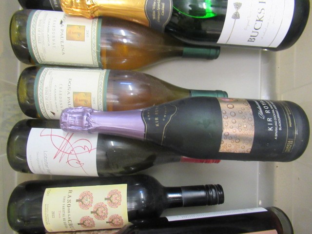 Thirteen bottles and one half bottle of European and New World wine Image