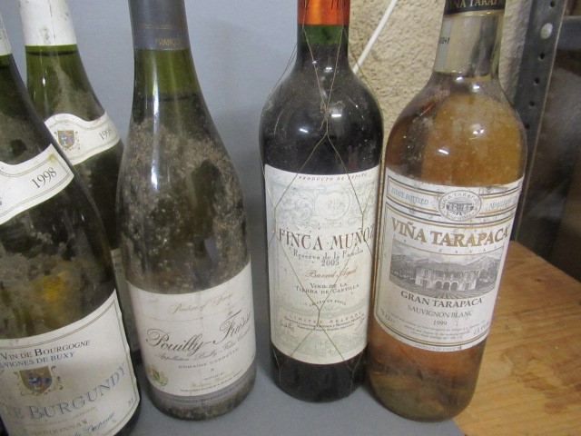 Twelve bottles of European wine and spirits including five bottles of Burgundy Image