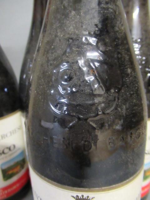 Four bottles Barbaresco Image