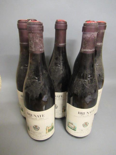 Eight bottles Brunate Image