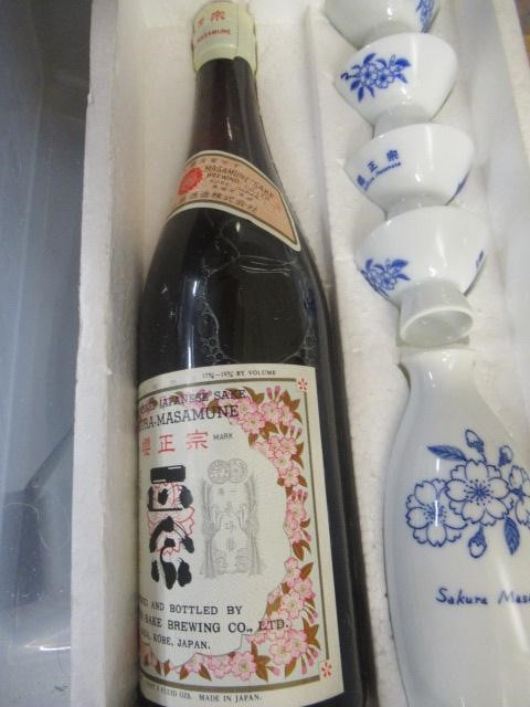 Five mixed bottles comprising one Sakura-Masamune Sake boxed set Image