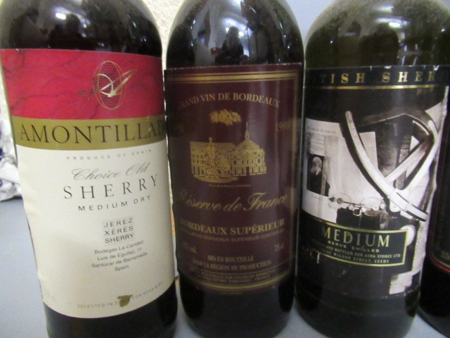 Ten bottles of mixed alcohol Image