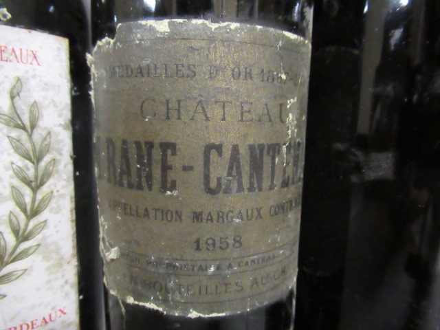 Four bottles of Bordeaux Image
