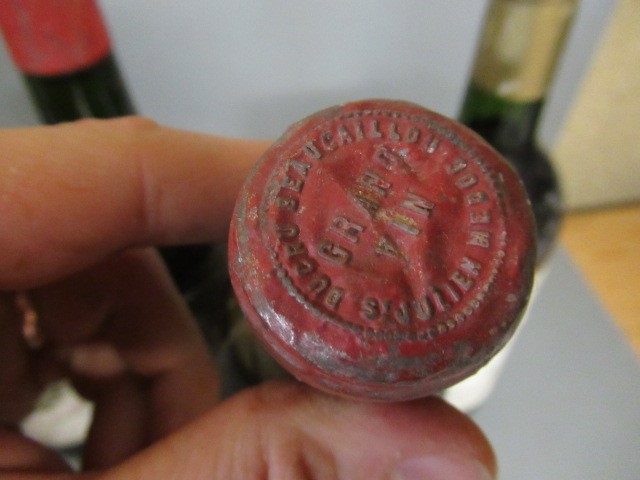 Four bottles of Bordeaux Image