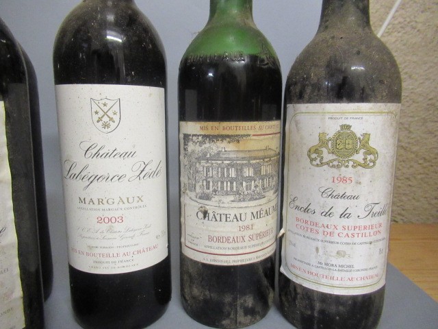 Seven bottles of Bordeaux Image
