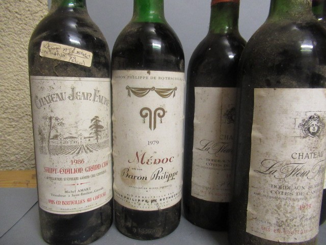 Seven bottles of Bordeaux Image