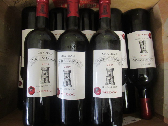 Thirteen bottles Chateau Tour St. Bonnet Image