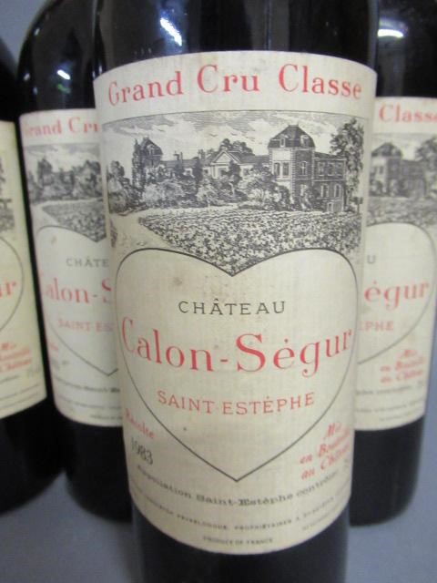 Four bottles Chateau Calon-Segur Image