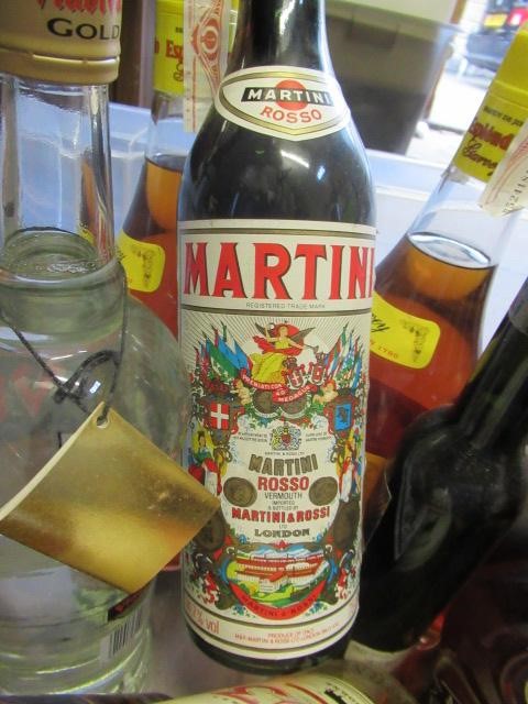 15 bottles of spirits including Valcourt Napoleon brandy Image