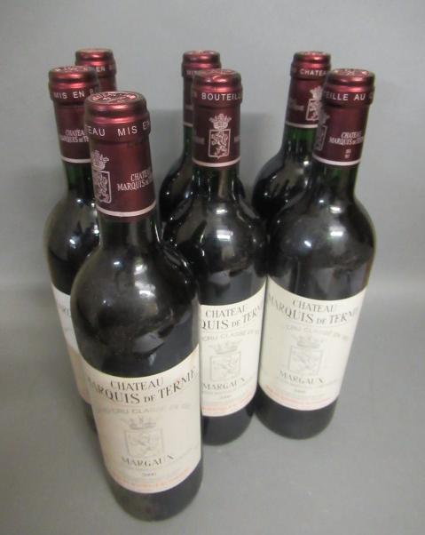 Seven bottles Chateau Marquis de Terme Image