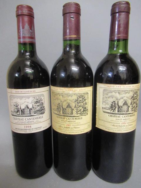 Three bottles Chateau Cantemerle Image