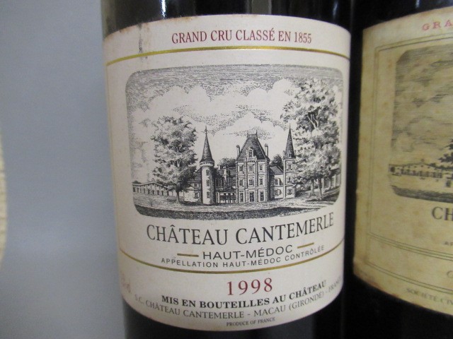 Three bottles Chateau Cantemerle Image