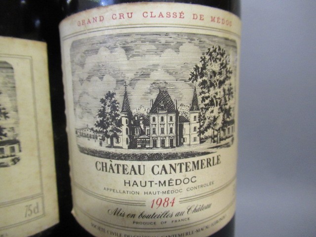 Three bottles Chateau Cantemerle Image