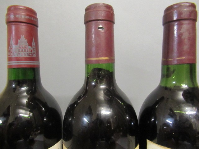 Three bottles Chateau Cantemerle Image