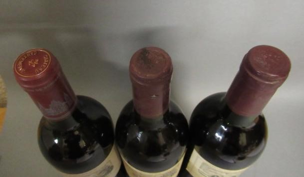 Three bottles Chateau Cantemerle Image