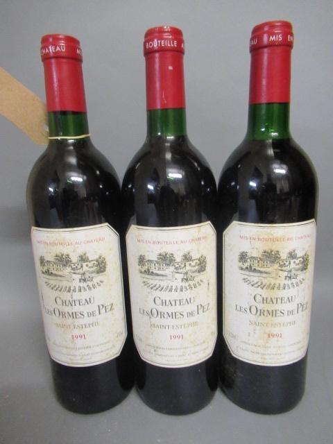 Three bottles Chateau Les Ormes de Pez Image