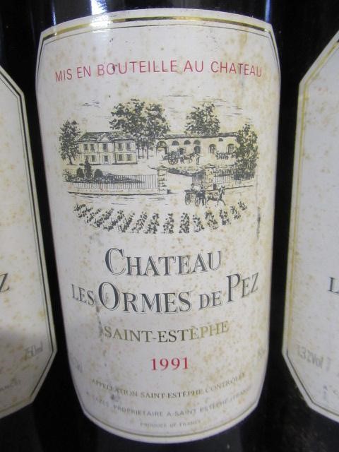 Three bottles Chateau Les Ormes de Pez Image