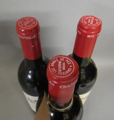 Three bottles Chateau Les Ormes de Pez Image