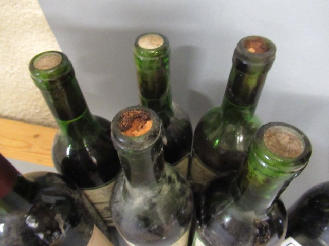Ten bottles of red Bordeaux Image