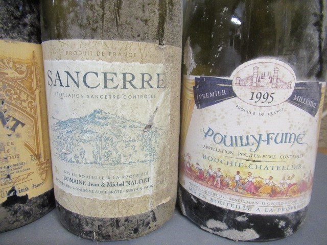 Seven bottles of white Burgundy Image