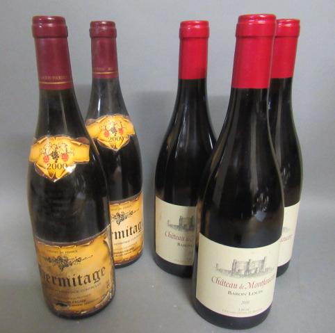 Three bottles Chateau Montfaucon Image