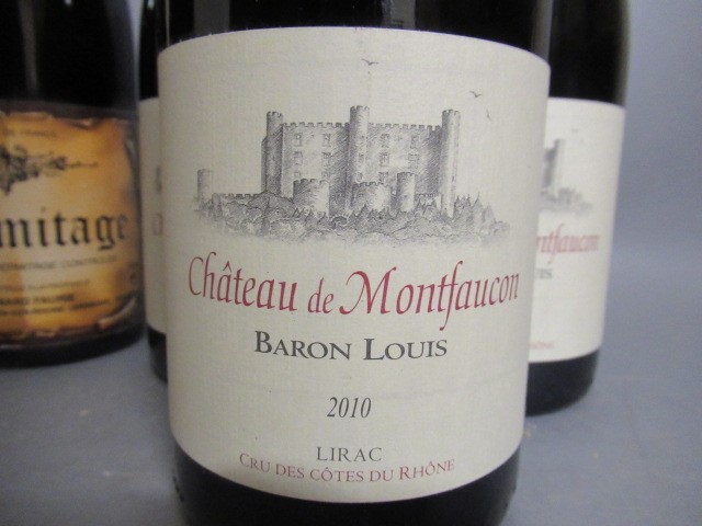 Three bottles Chateau Montfaucon Image