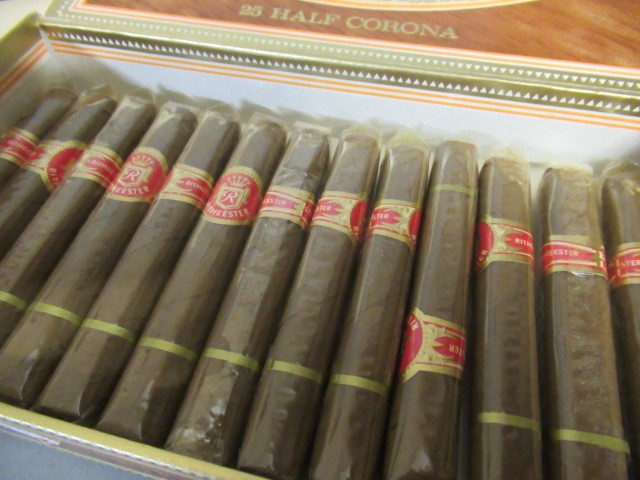 Two part filled boxes of cigars Image