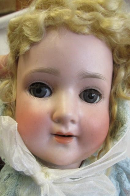 A Schoenau & Hoffmeister bisque socket head doll Image