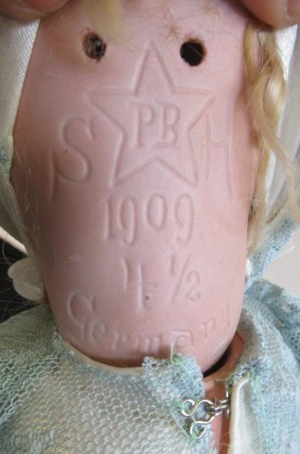 A Schoenau & Hoffmeister bisque socket head doll Image