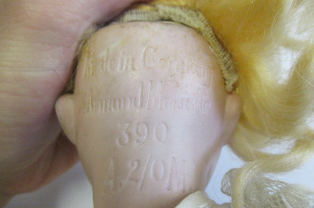 Three Armand Marseille bisque head dolls Image