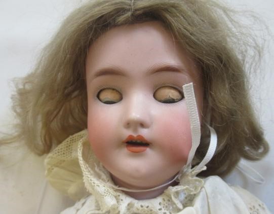 Two bisque socket head dolls Image