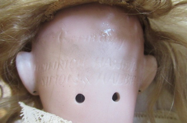 Two bisque socket head dolls Image
