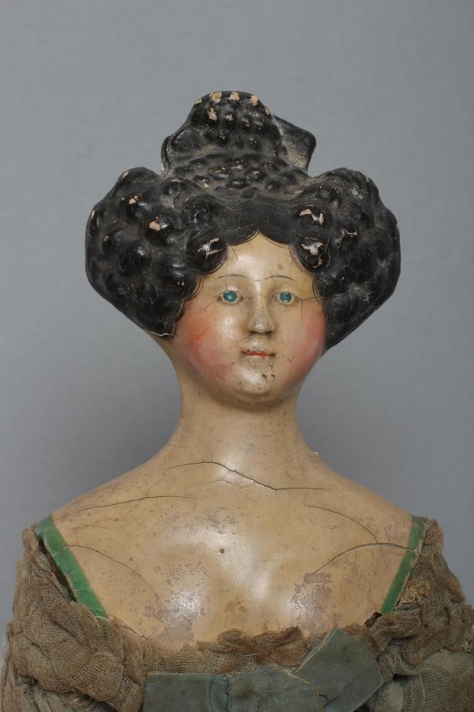 A papier mache doll Image