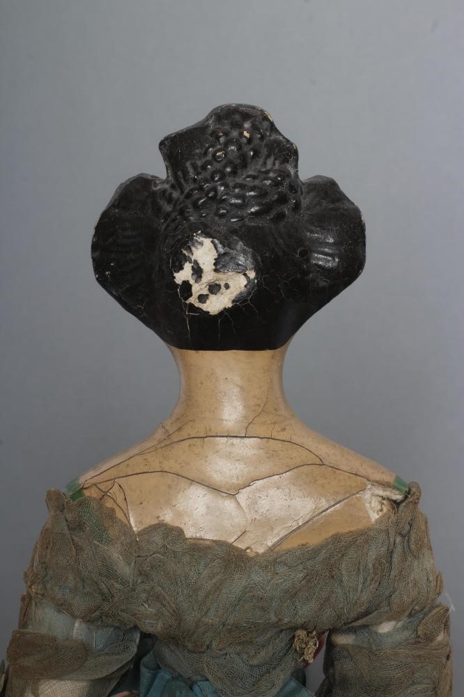 A papier mache doll Image