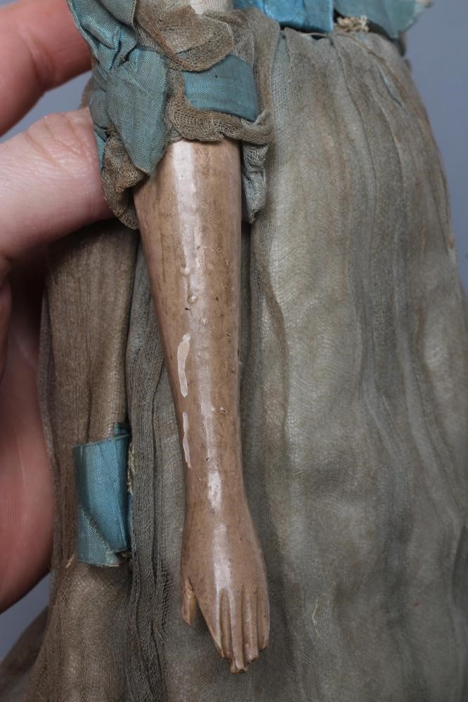 A papier mache doll Image