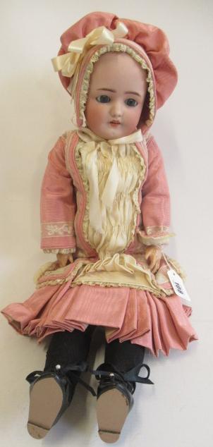 A Simon & Halbig bisque socket head doll Image