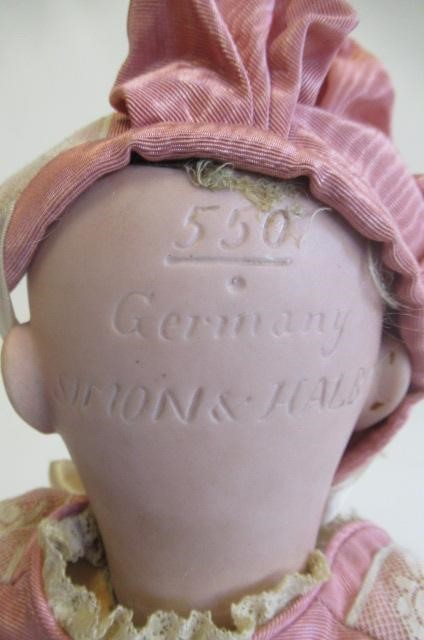 A Simon & Halbig bisque socket head doll Image