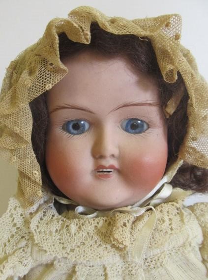 Three English bisque shoulder head dolls Image