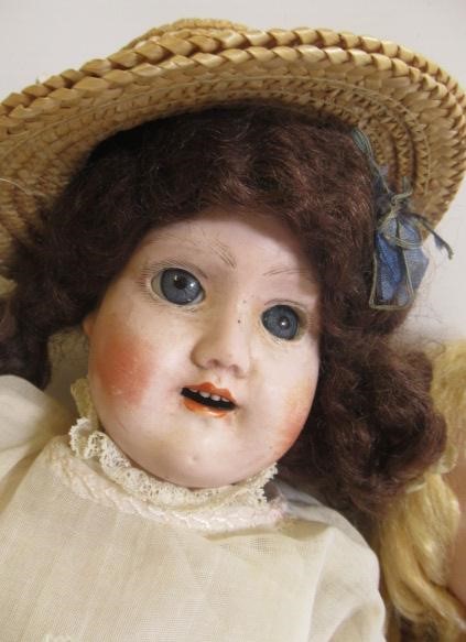 Three English bisque shoulder head dolls Image