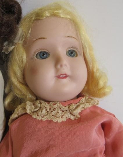 Three English bisque shoulder head dolls Image