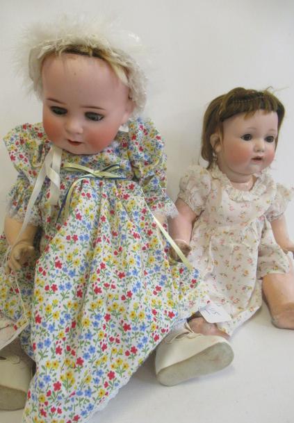Two bisque socket head character dolls Image