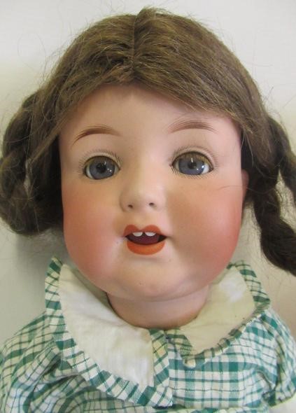 Two Armand Marseille bisque socket head character dolls Image