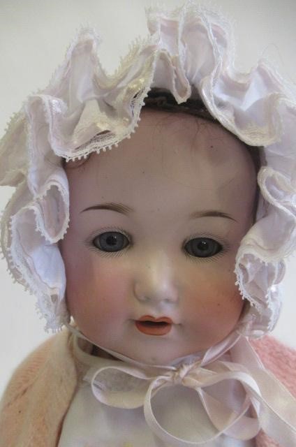 Two Armand Marseille bisque socket head character dolls Image