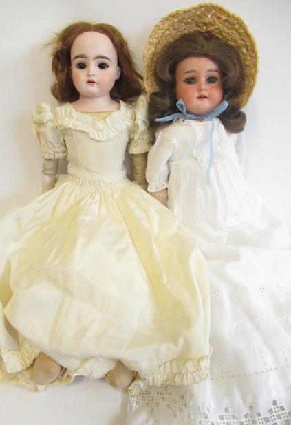 Two Armand Marseille bisque shoulder head dolls Image