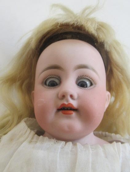 A Simon &  Halbig bisque shoulder head doll Image