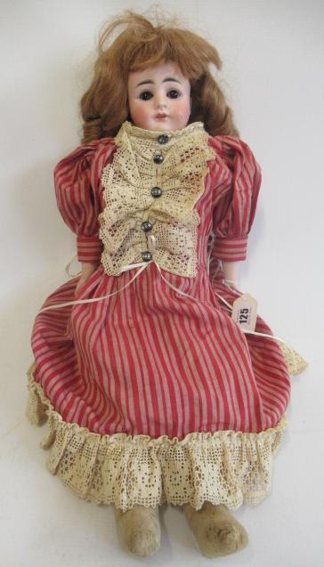 A German bisque shoulder head doll Image