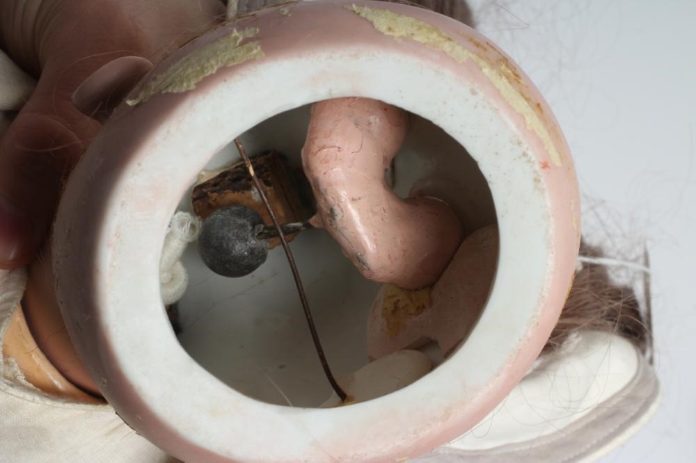 A Bebe Jumeau bisque socket head doll Image