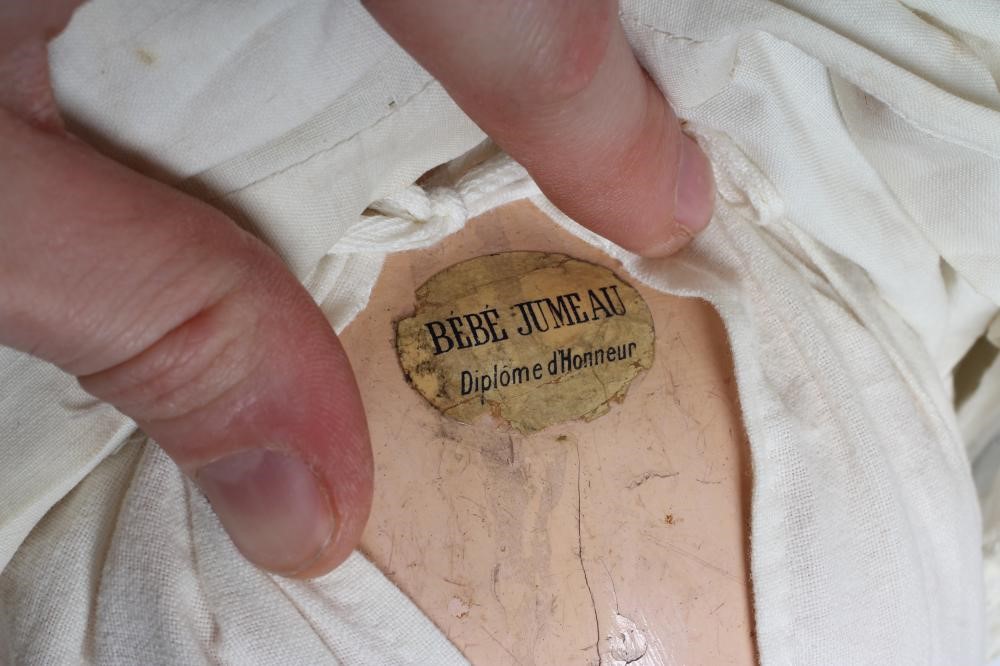 A Bebe Jumeau bisque socket head doll Image