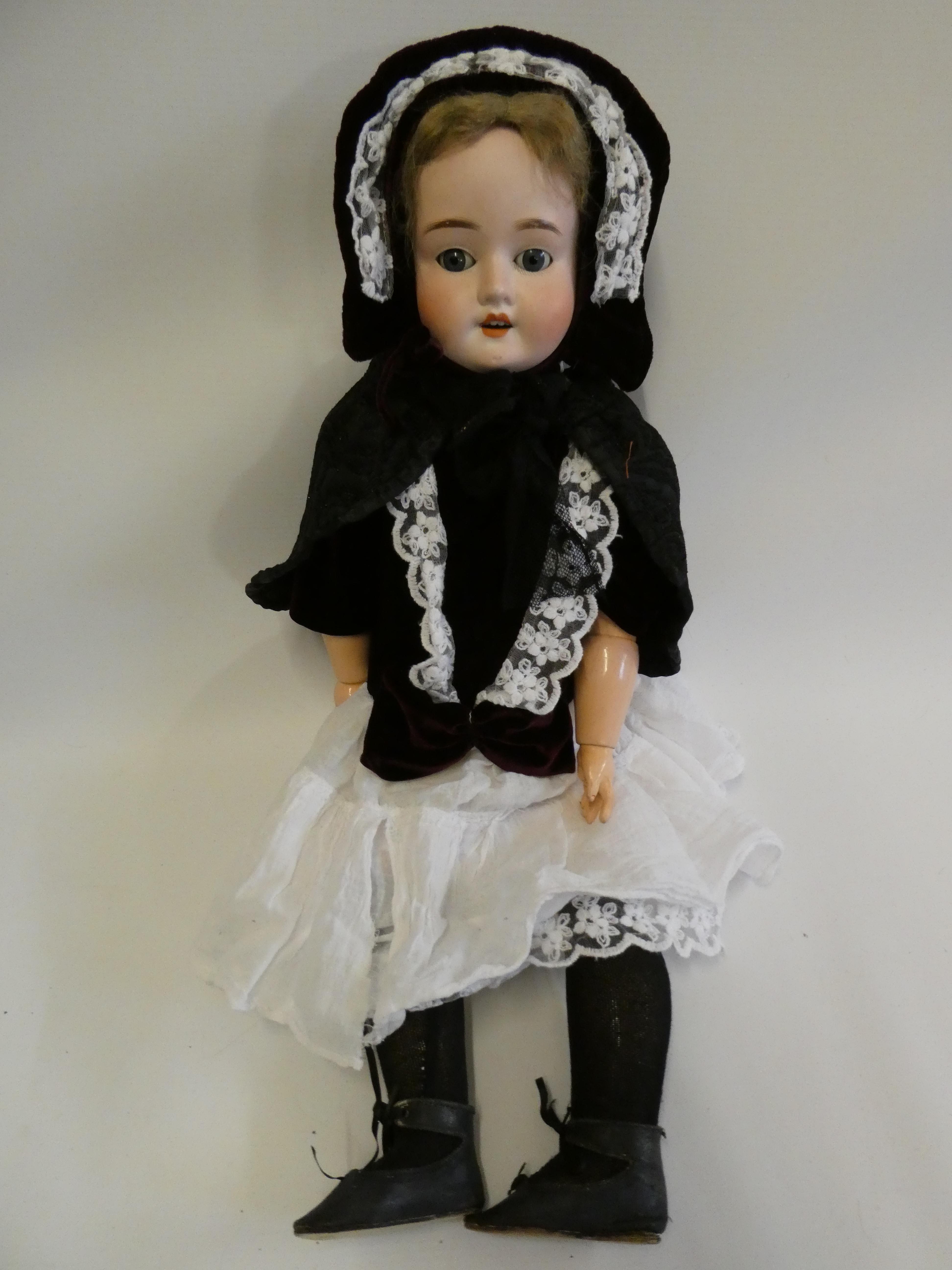 A Schoenau & Hoffmeister bisque socket head doll Image