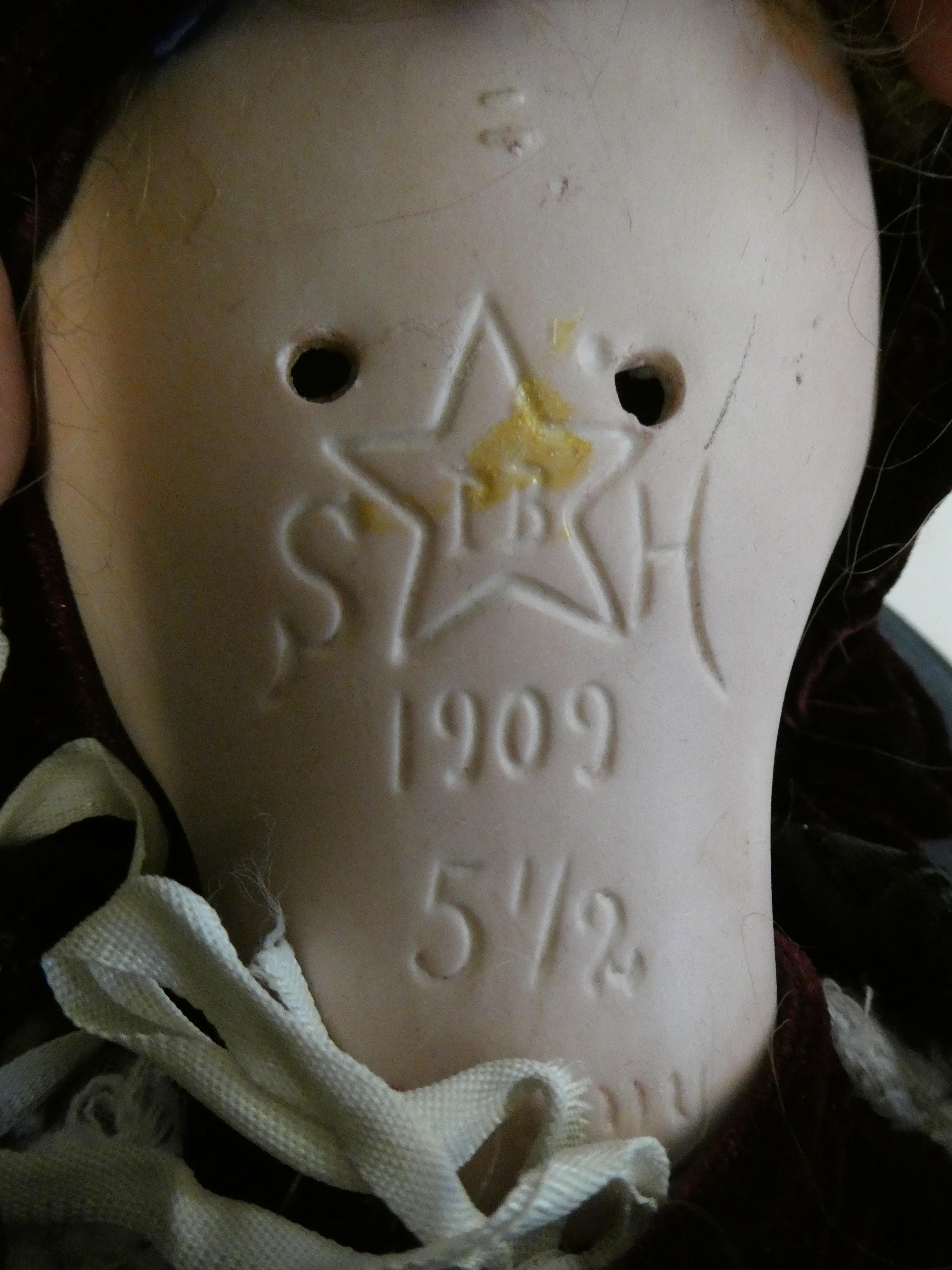 A Schoenau & Hoffmeister bisque socket head doll Image